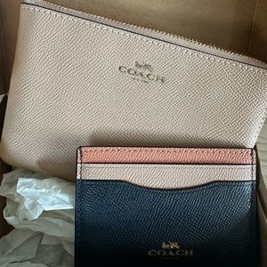 Coach pouch with wallet. Brand new. With box.